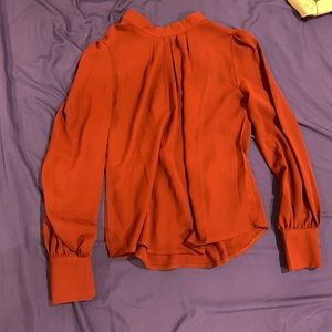 Women’s burgundy blouse
